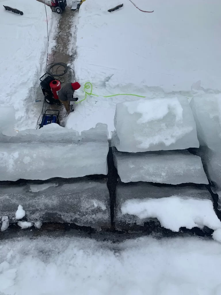Above All Roofing responding to urgent snow buildup with professional-grade equipment