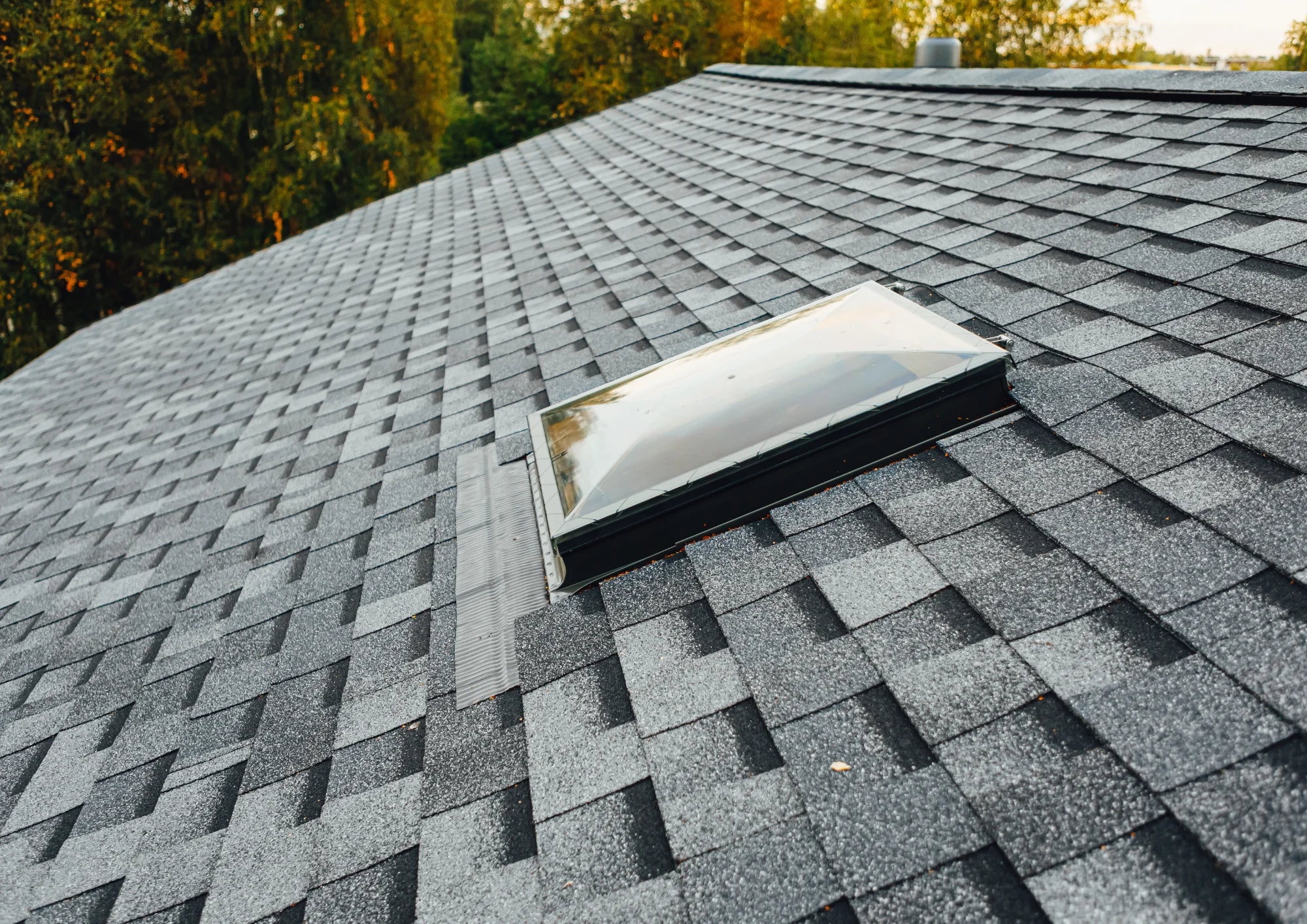 New asphalt shingle roof installed on a Minnesota home, showing long-lasting roofing materials designed for harsh weather