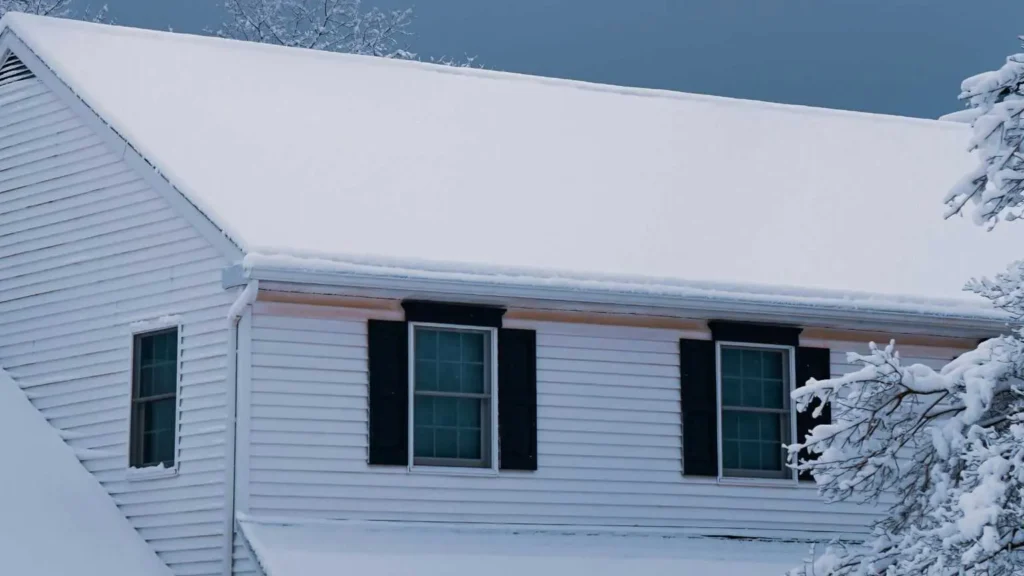 Heavy snow buildup on a residential roof