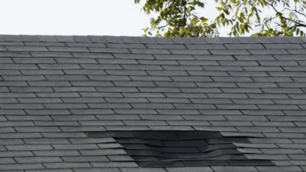 Missing roof shingles exposing underlayment causing heat loss and higher energy bills in Rochester MN