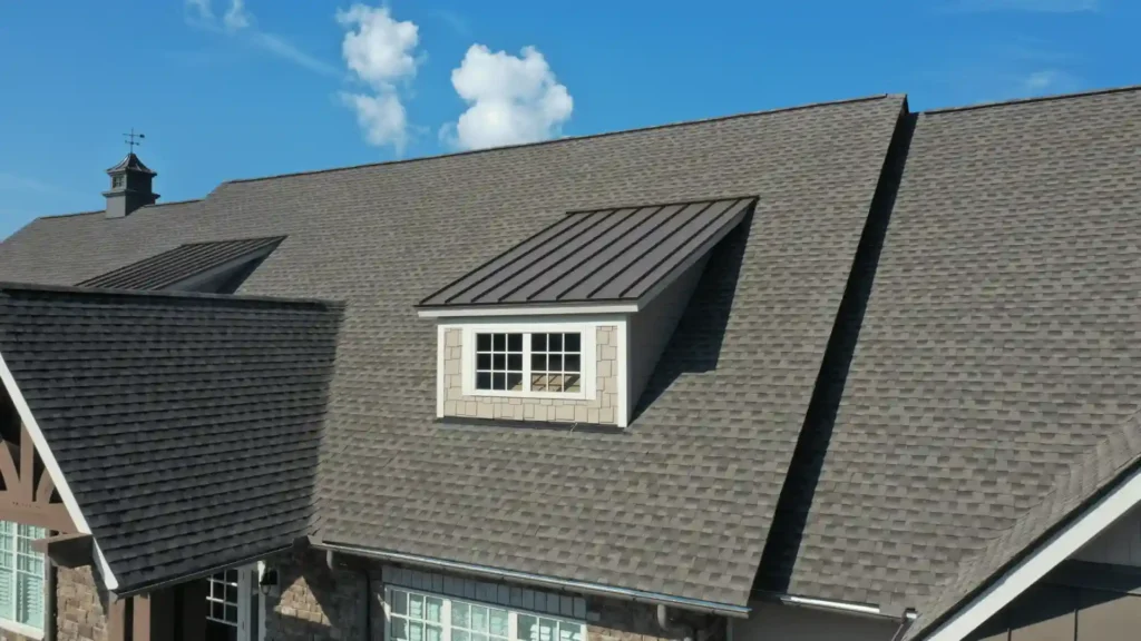 Properly installed architectural asphalt shingle roof with visible ridge lines and flashing on a residential home in Rochester MN