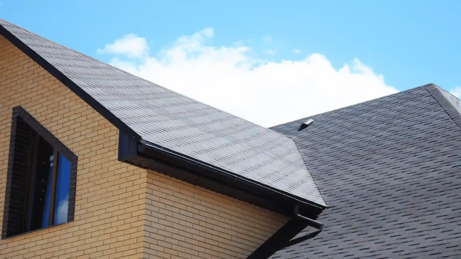 Well-maintained asphalt shingle roof on a Rochester MN home after regular maintenance